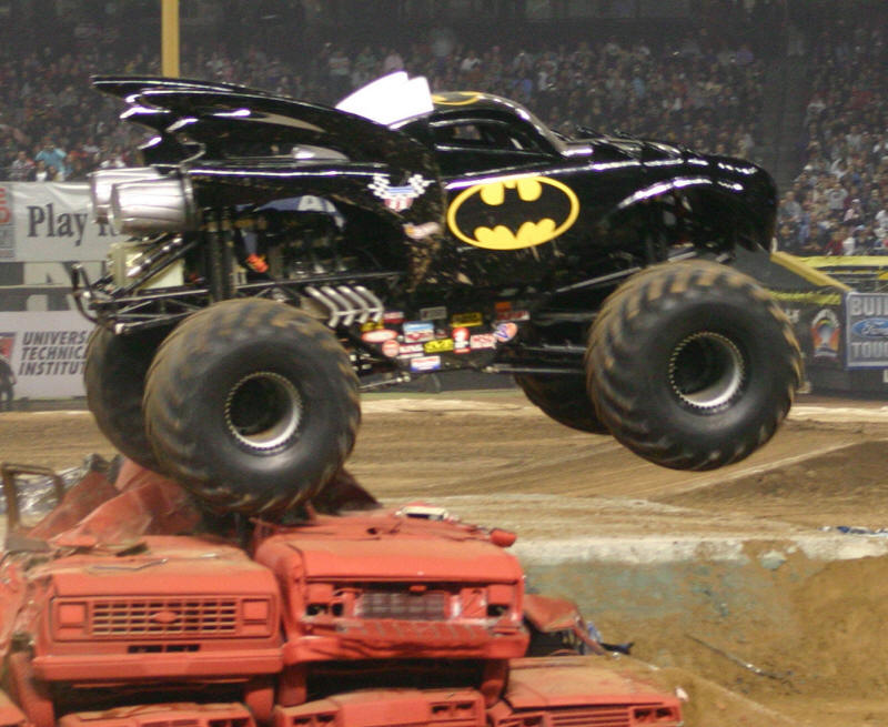 Batman Monster Truck crushing cars on the track