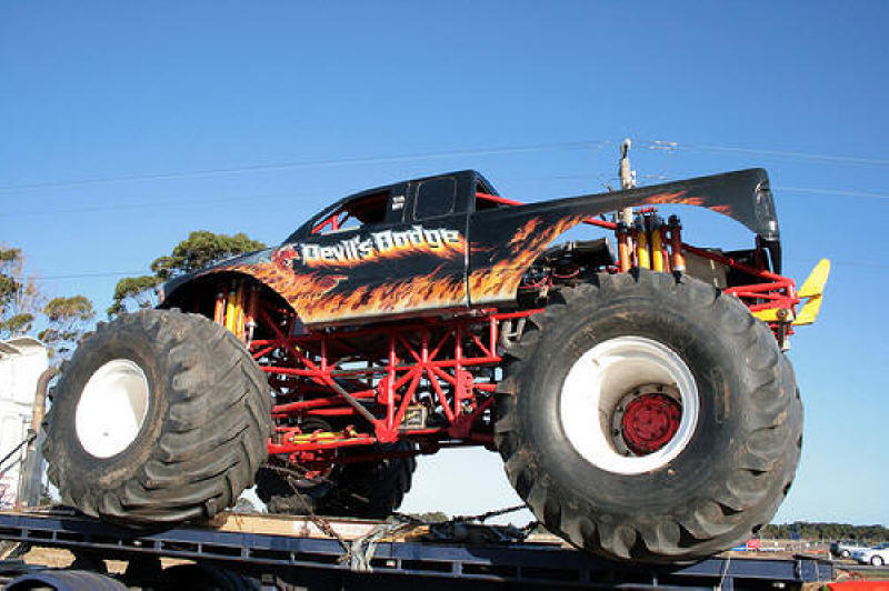 Devil's Dodge Monster Truck strapped on the trailer for the ride home
