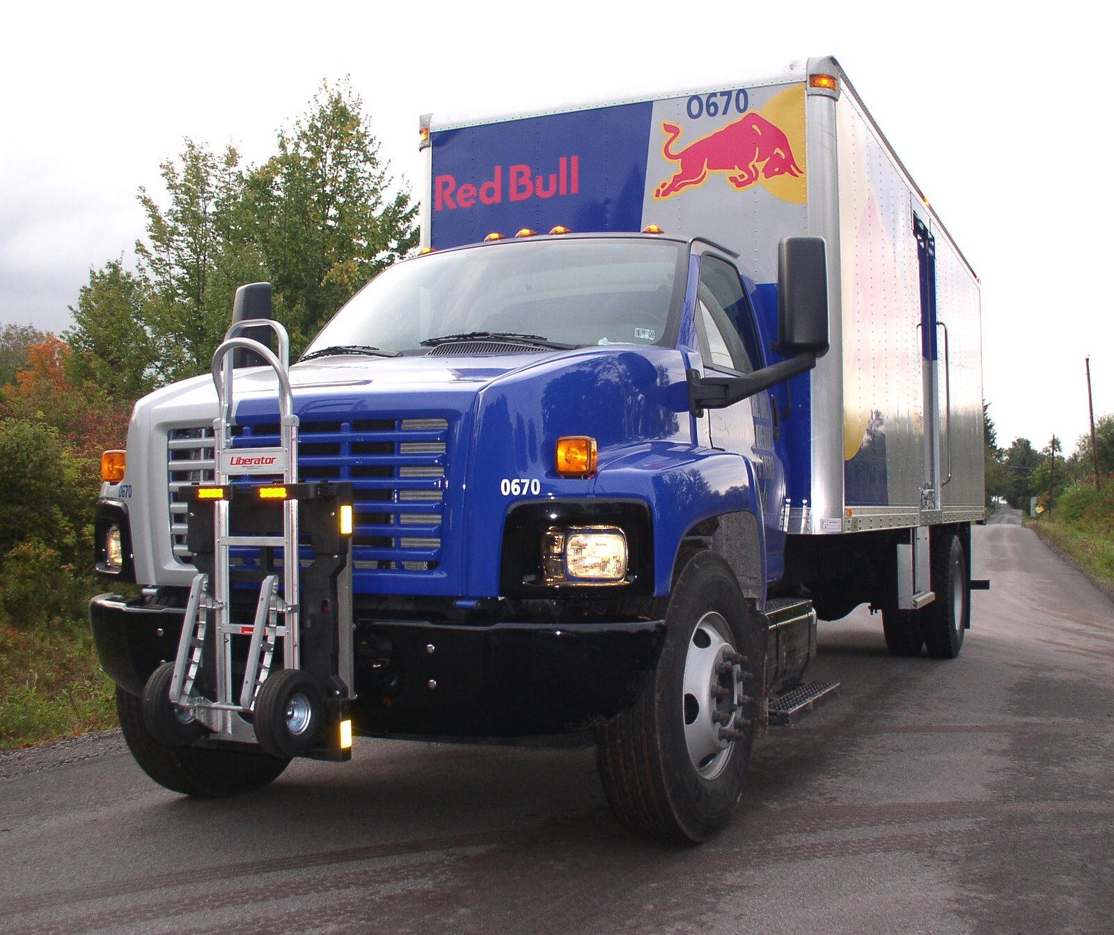 Red Bull GMC Straight Truck blue truck with hand cart hand truck