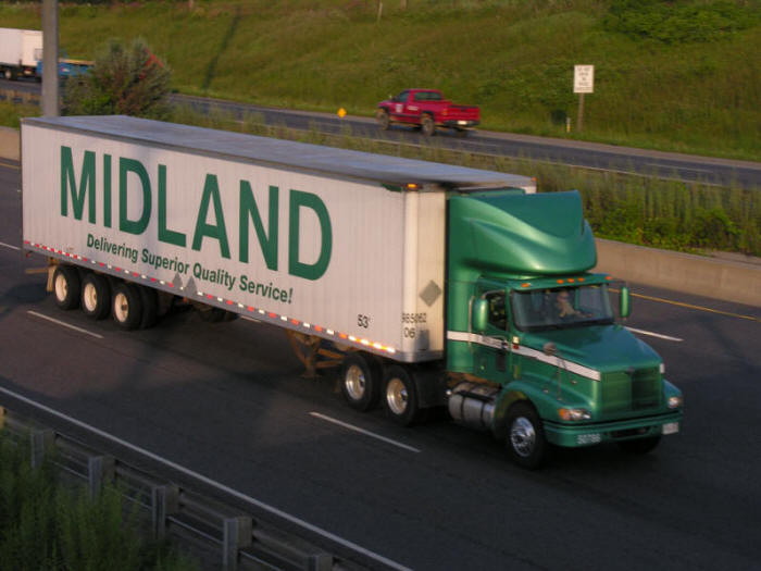 Midland day cab on highway from Waterdown road overpass