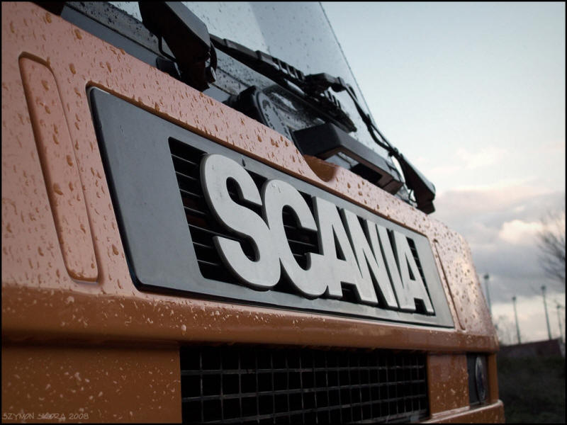 Scania Truck Logo Nameplate grill hood picture on a rainy day