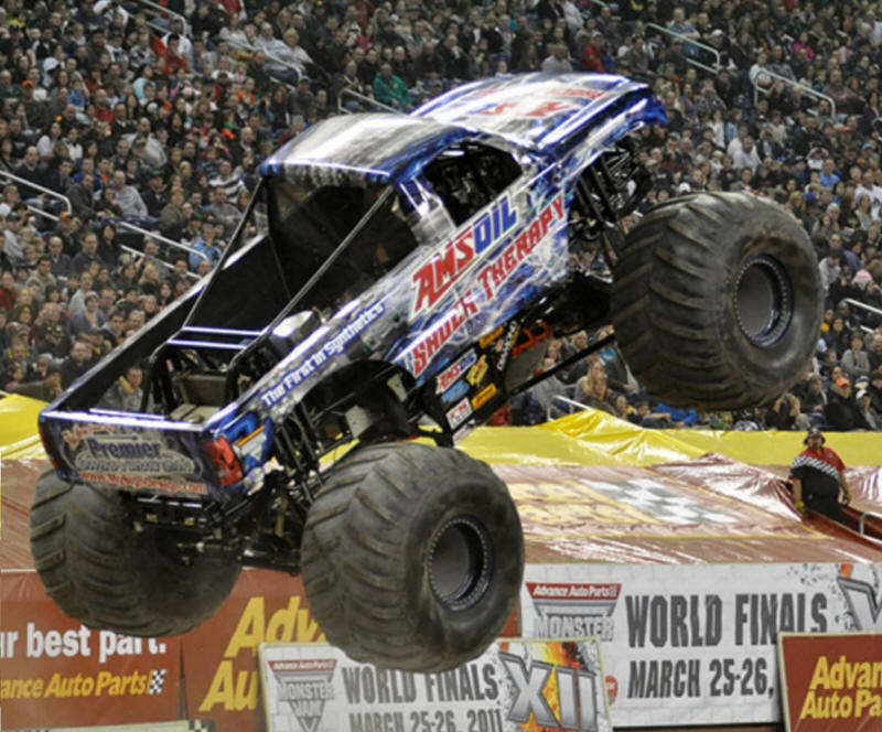 Shock Therapy Monster Truck rearing up in the air like a bold stallion
