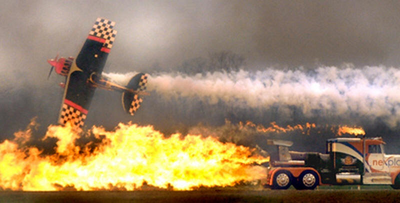 Les Shockley's triple engine Shockwave gives impressive show of flames with biplane passing