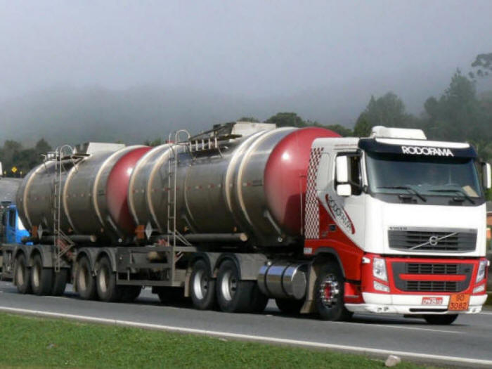 Volvo FH tanker trailer truck delivering fuel in Brazil Rodofama